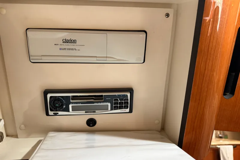 Slide: The Image of Clarion audio system in 2000 Sea Ray 410 Sundancer boat interior. - 45