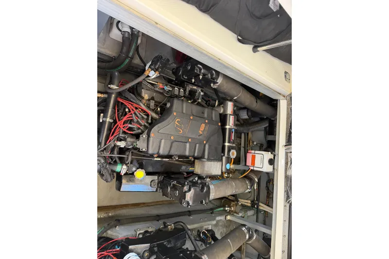 Slide: The Image of Engine compartment of a 2000 Sea Ray 410 Sundancer. - 48