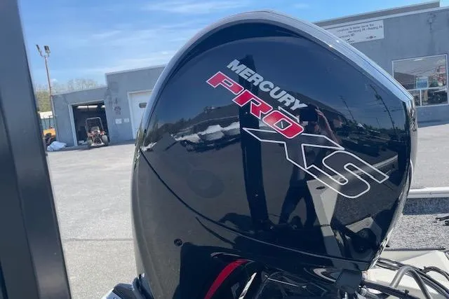 Slide: The Image of 2025 Tracker Pro Team 195 Tournament Edition with Mercury Pro XS engine in a dealership lot. - 10