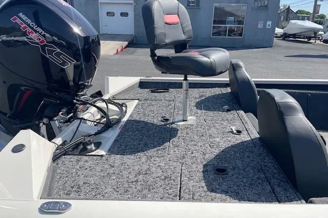 Slide: The Image of 2025 Tracker Pro Team 195 Tournament Edition boat with Mercury Pro XS engine, featuring comfortable seating. - 12