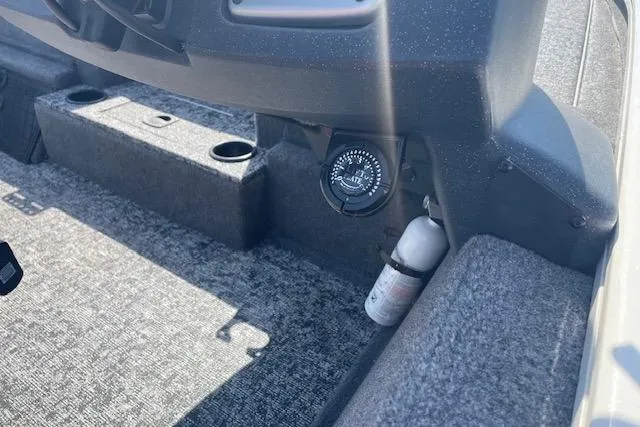 Slide: The Image of 2025 Tracker Pro Team 195 Tournament Edition boat interior with compass and fire extinguisher. - 13