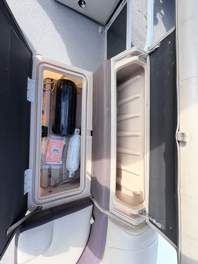 Slide: The Image of Storage compartment in Sun Tracker Party Barge 20 DLX boat, 2018 model. - 25