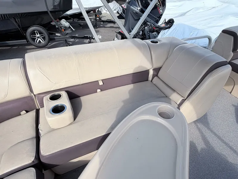 Slide: The Image of Interior of a 2018 Sun Tracker Party Barge 20 DLX with seating area. - 5