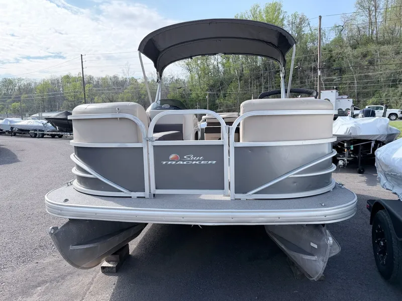 Slide: The Image of 2018 Sun Tracker Party Barge 20 DLX pontoon boat in parking lot. - 9