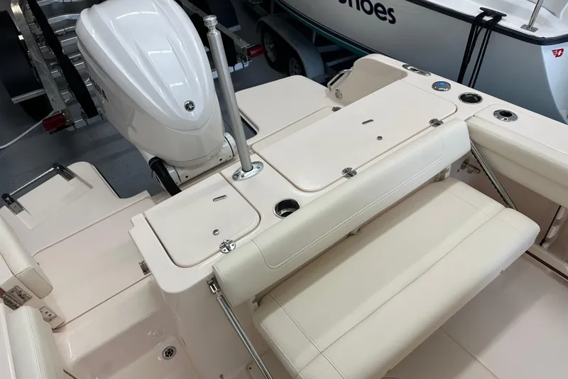 Slide: The Image of 2023 Grady-White Fisherman 236 boat interior with seating and motor detail. - 10