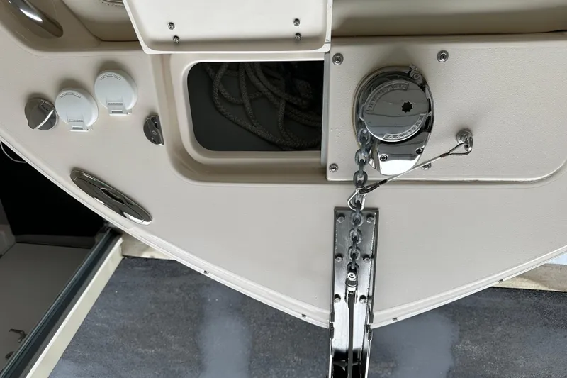 Slide: The Image of 2023 Grady-White Fisherman 236 boat anchor system and storage compartment. - 18