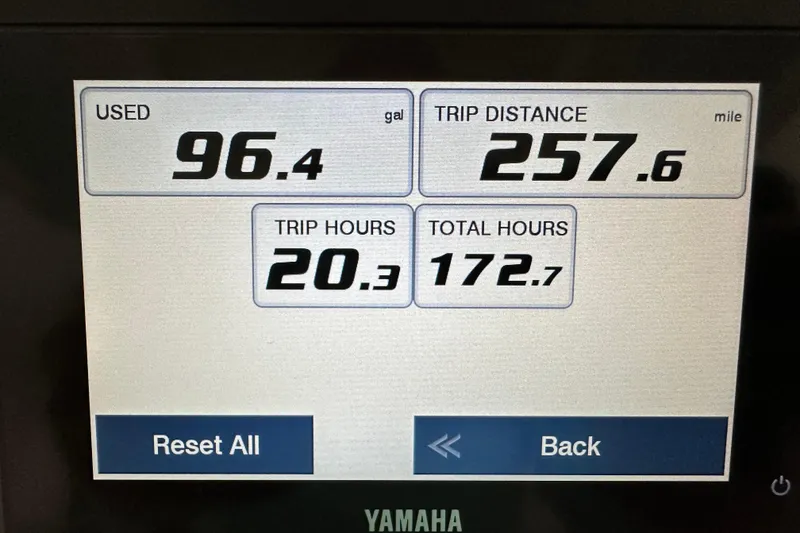 Slide: The Image of Dashboard display showing fuel usage, trip distance, and hours for 2023 Grady-White Fisherman 236. - 19