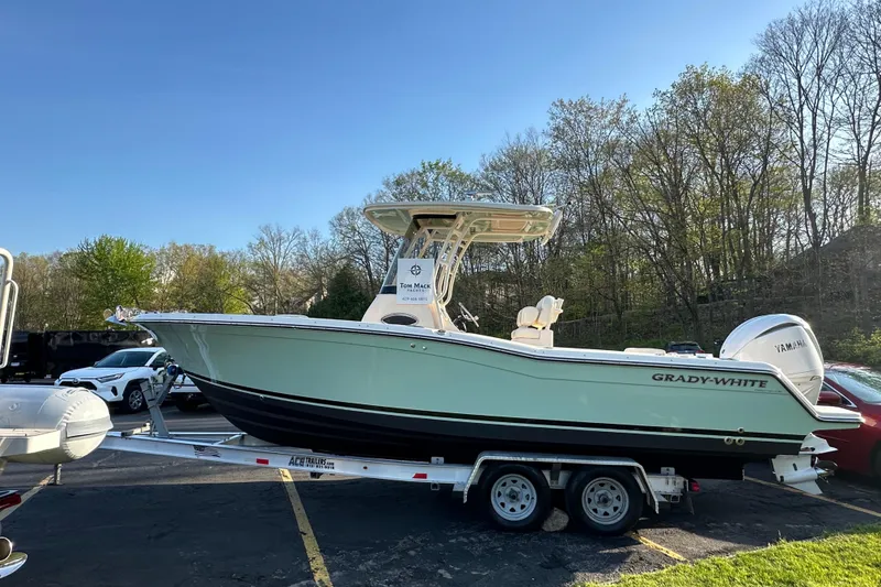 Slide: The Image of 2023 Grady-White Fisherman 236 boat on trailer in parking lot. - 4