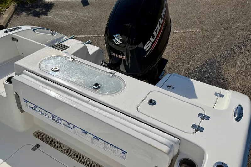 Slide: The Image of 2018 Sea Pro 219 Center Console boat with Suzuki 200 engine, featuring a saltwater fish ruler. - 26