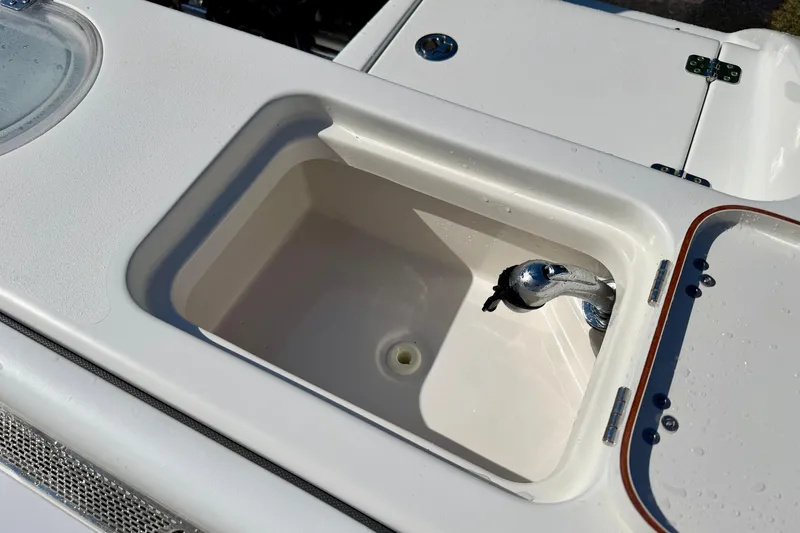 Slide: The Image of Livewell compartment on a 2018 Sea Pro 219 Center Console boat. - 32