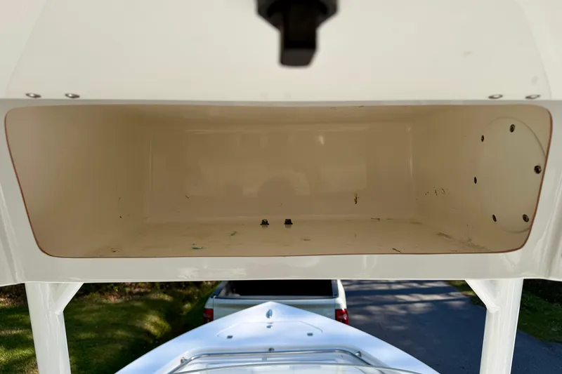 Slide: The Image of Storage compartment of a 2018 Sea Pro 219 Center Console boat, open and empty. - 34
