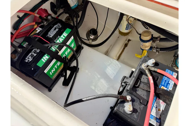 Slide: The Image of 2018 Sea Pro 219 Center Console boat battery compartment with Interstate batteries. - 36