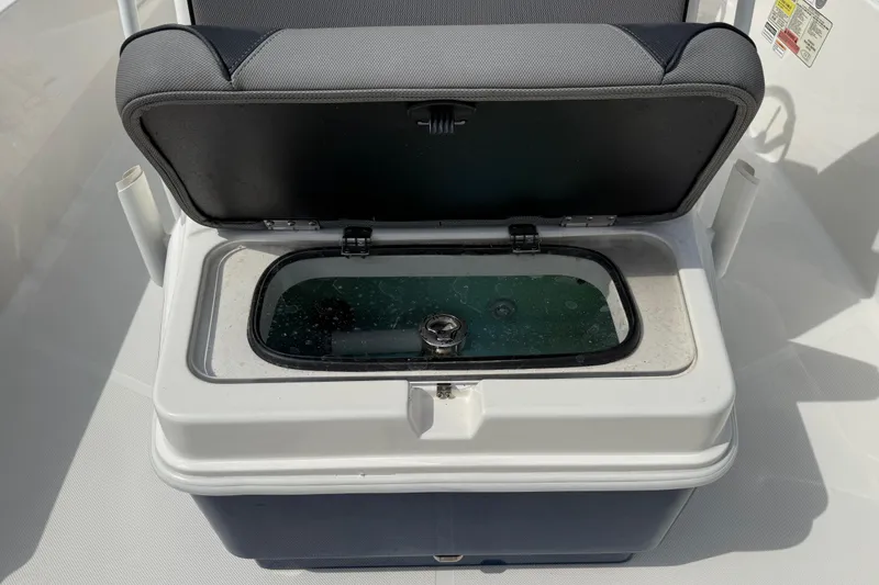 Slide: The Image of Livewell on 2023 Skeeter SX230 boat, open lid showing interior. - 33