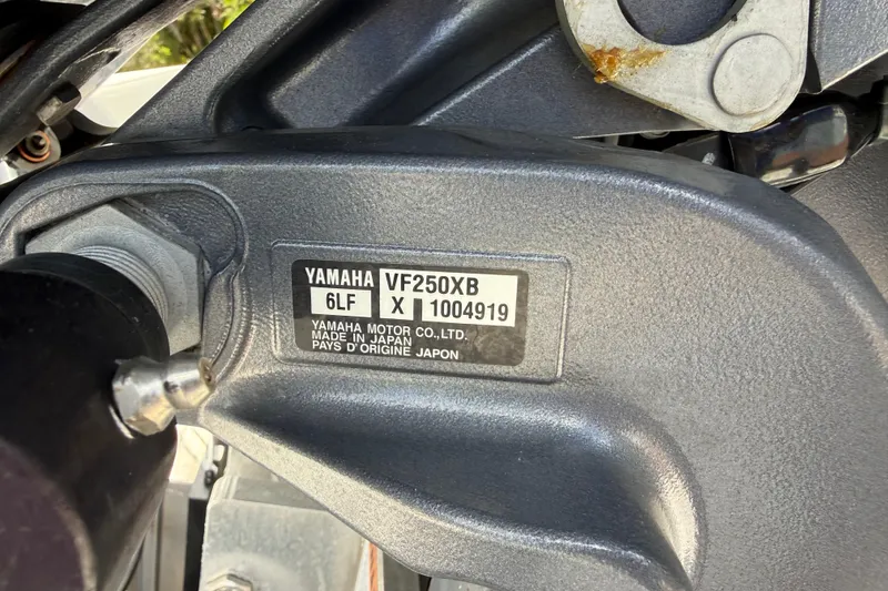 Slide: The Image of Close-up of Yamaha VF250XB engine label on 2023 Skeeter SX230 boat. - 39