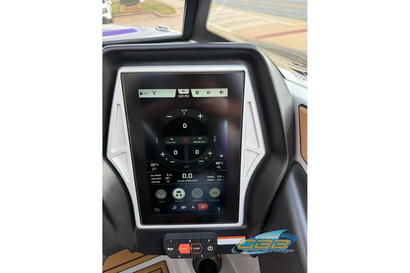 Slide: The Image of 2022 Tigé Z3 boat dashboard with touchscreen display and control buttons. - 24