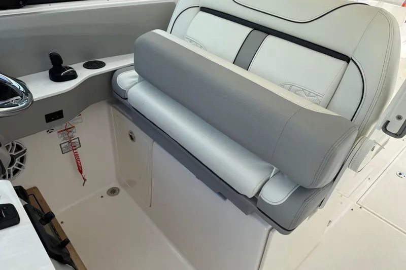Slide: The Image of 2023 Regal LX36 boat interior with luxurious seating and modern controls. - 20