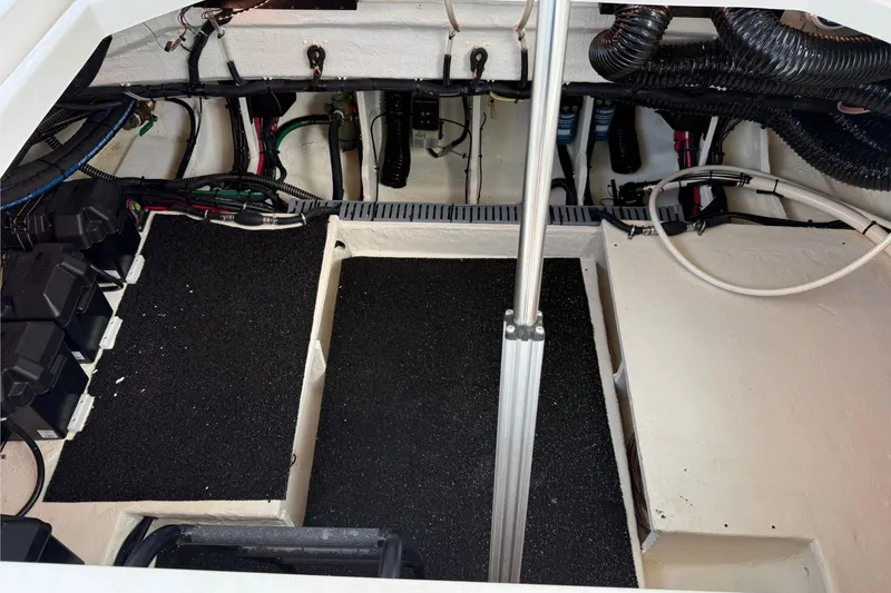 Slide: The Image of 2023 Regal LX36 engine compartment with wiring and components visible. - 24