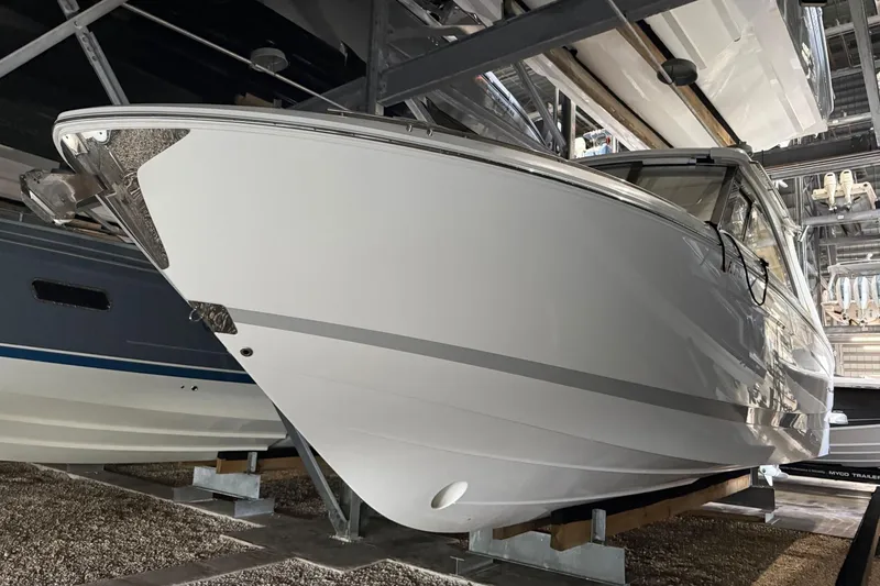 Slide: The Image of 2023 Regal LX36 boat in storage, showcasing sleek design and modern features. - 27