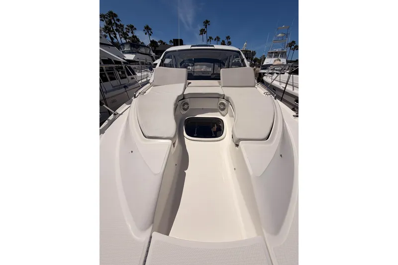Slide: The Image of 2018 Sea Ray Sundancer 350 Coupe yacht with spacious deck and seating area. - 16