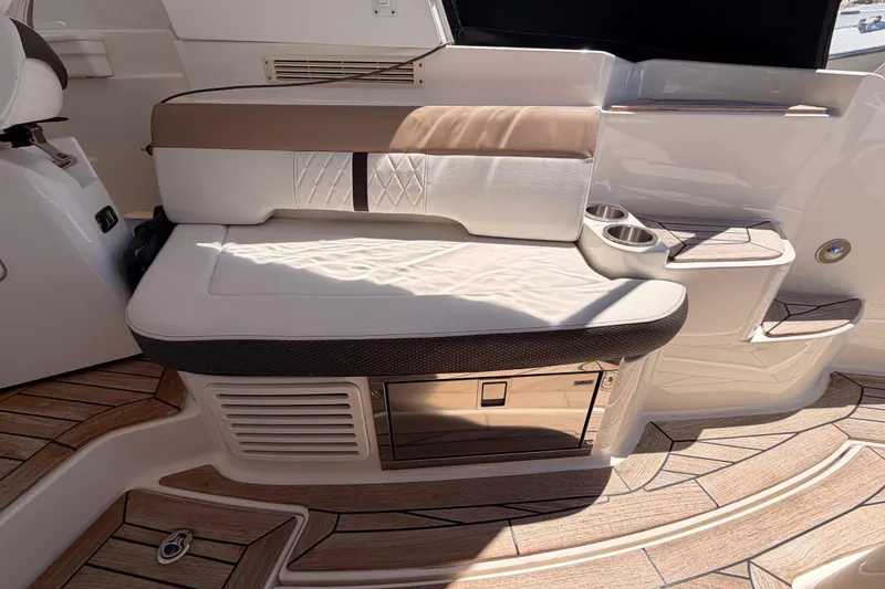 Slide: The Image of Luxurious seating area on 2018 Sea Ray Sundancer 350 Coupe yacht with cup holders. - 24