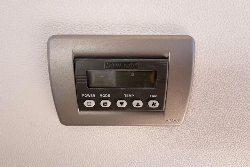 Slide: The Image of Control panel on 2018 Sea Ray Sundancer 350 Coupe boat interior. - 30