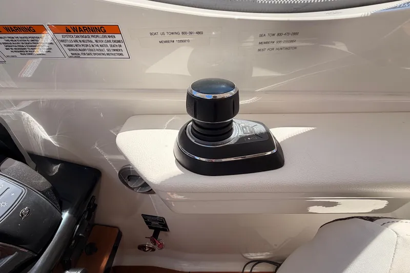 Slide: The Image of Joystick control on 2018 Sea Ray Sundancer 350 Coupe boat dashboard. - 35