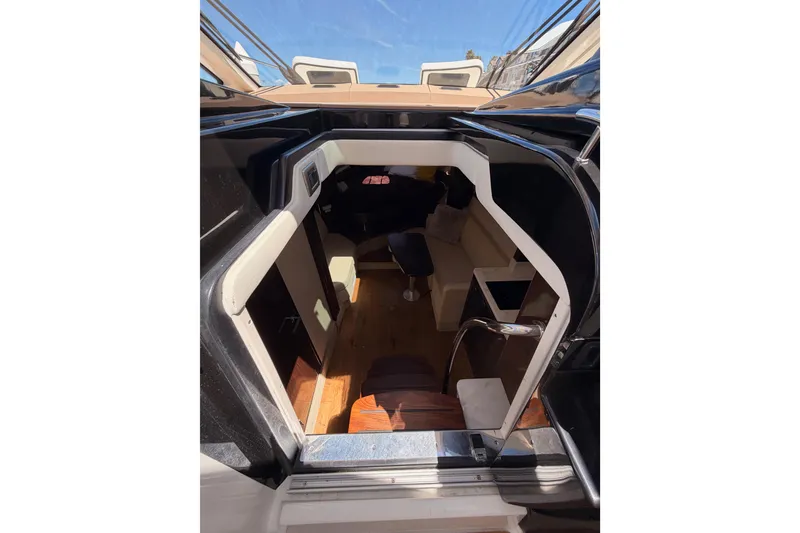 Slide: The Image of Interior view of 2018 Sea Ray Sundancer 350 Coupe cabin with seating and table. - 39