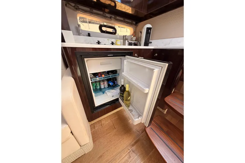 Slide: The Image of Open mini fridge in 2018 Sea Ray Sundancer 350 Coupe yacht interior. - 43
