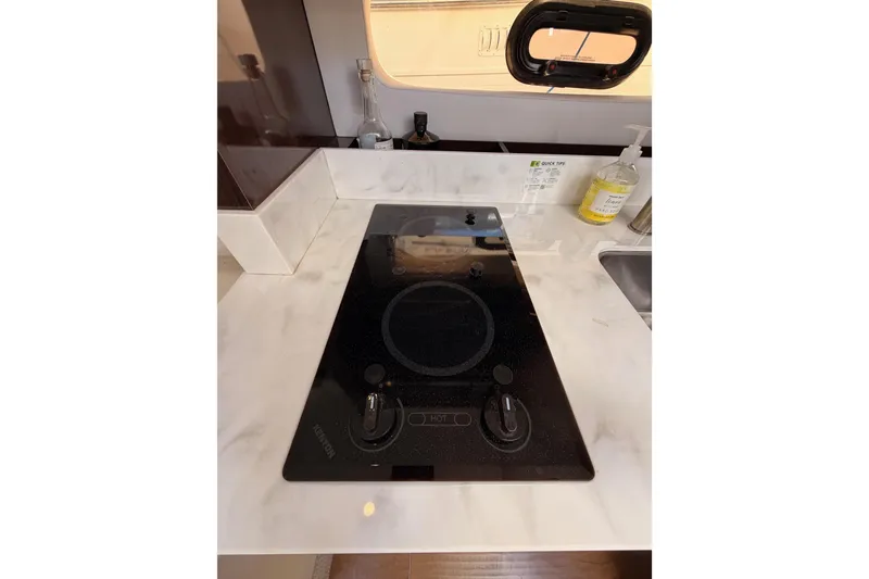 Slide: The Image of Modern kitchen area in 2018 Sea Ray Sundancer 350 Coupe yacht. - 44