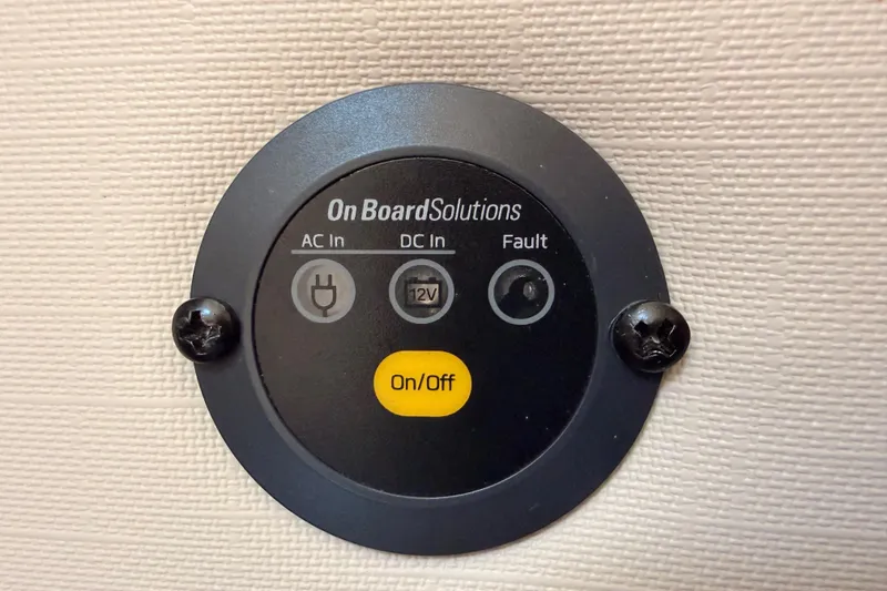 Slide: The Image of On Board Solutions power panel on 2018 Sea Ray Sundancer 350 Coupe. - 69