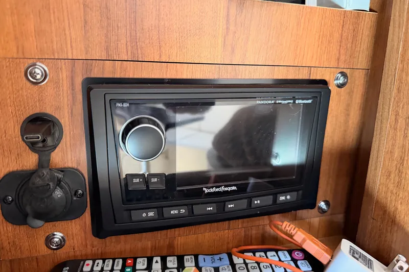 Slide: The Image of 2018 Sea Ray Sundancer 350 Coupe audio system with Rockford Fosgate stereo and USB port. - 70