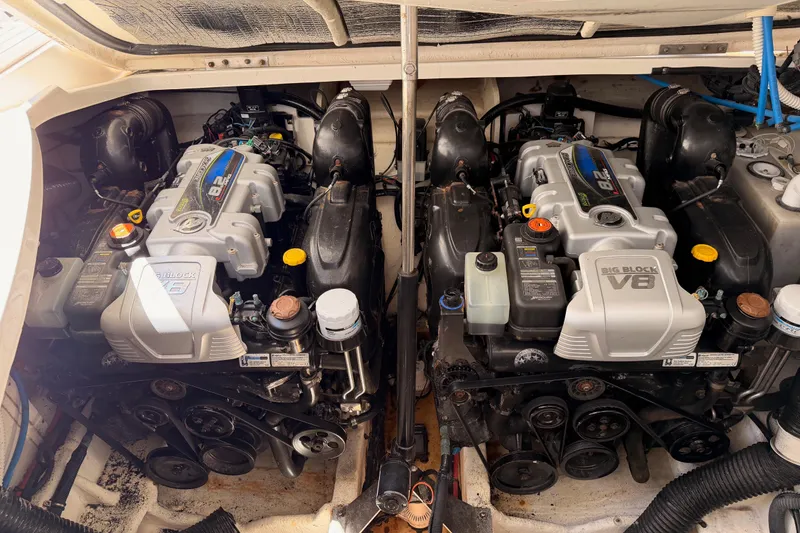 Slide: The Image of Twin V8 engines in a 2018 Sea Ray Sundancer 350 Coupe boat. - 72