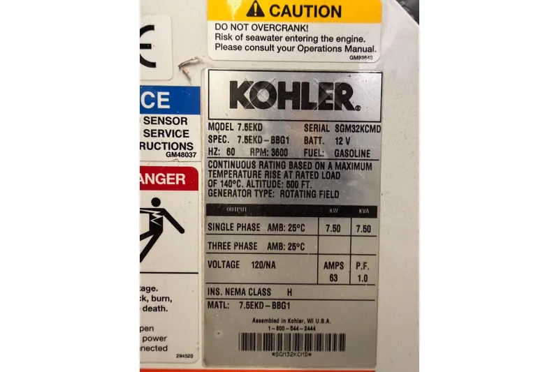 Slide: The Image of Kohler generator label on 2018 Sea Ray Sundancer 350 Coupe, model 7.5EKD, gasoline-powered. - 73