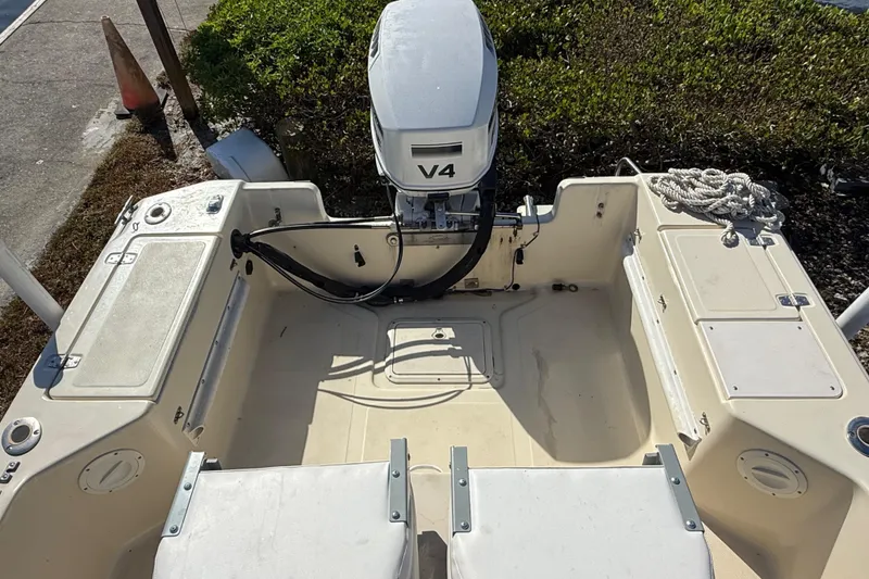Slide: The Image of 1995 Scout 172 Sportfish boat with V4 engine, viewed from above. - 15