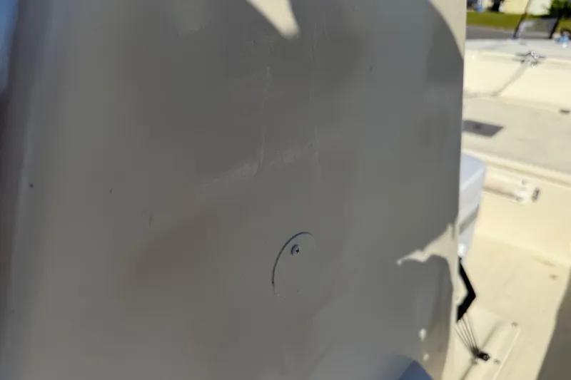 Slide: The Image of Close-up of a 1995 Scout 172 Sportfish boat interior, showing a smooth surface detail. - 29