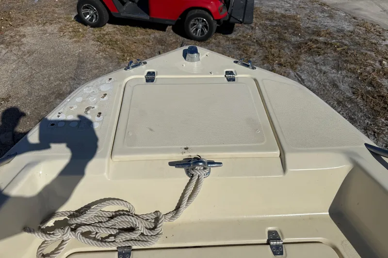 Slide: The Image of Bow of a 1995 Scout 172 Sportfish boat with rope and cleats. - 36