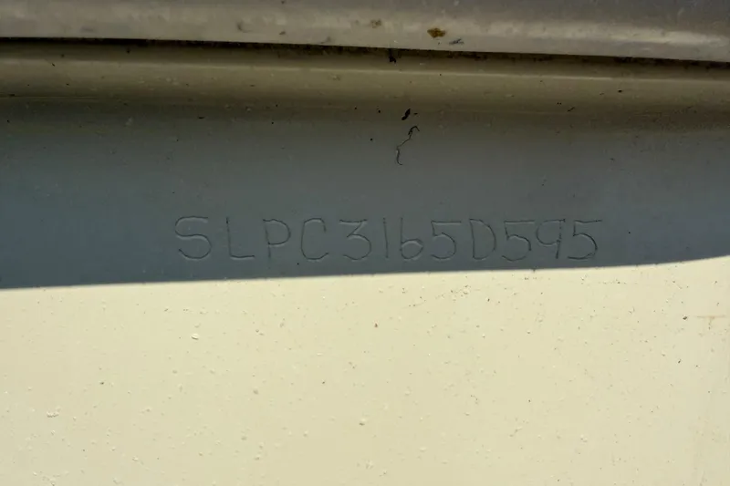 Slide: The Image of Hull identification number on a 1995 Scout 172 Sportfish boat. - 43