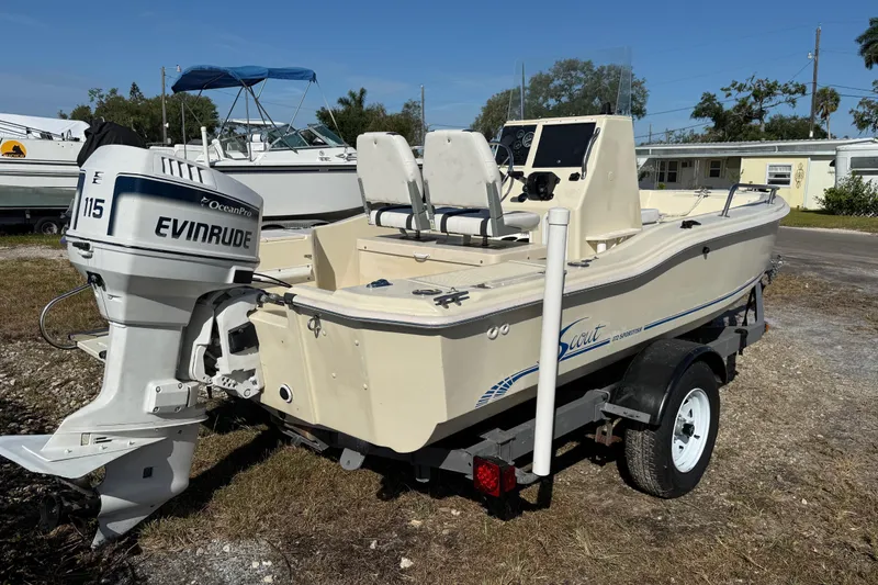 Slide: The Image of 1995 Scout 172 Sportfish boat with Evinrude 115 outboard motor on trailer. - 5