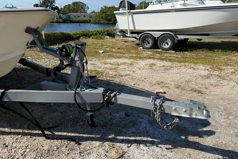 Slide: The Image of Trailer hitch of a 1995 Scout 172 Sportfish boat on a sunny day. - 8