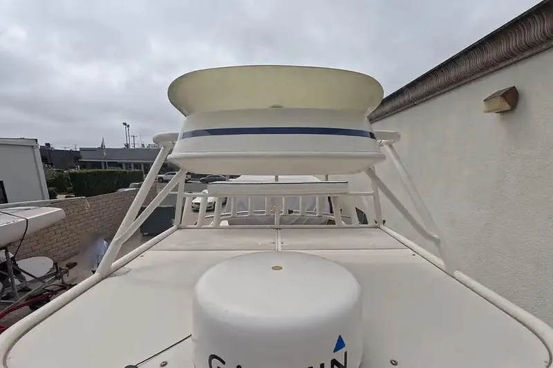 Slide: The Image of 1978 SeaCraft SC 21 Open boat with radar equipment, docked outdoors. - 10
