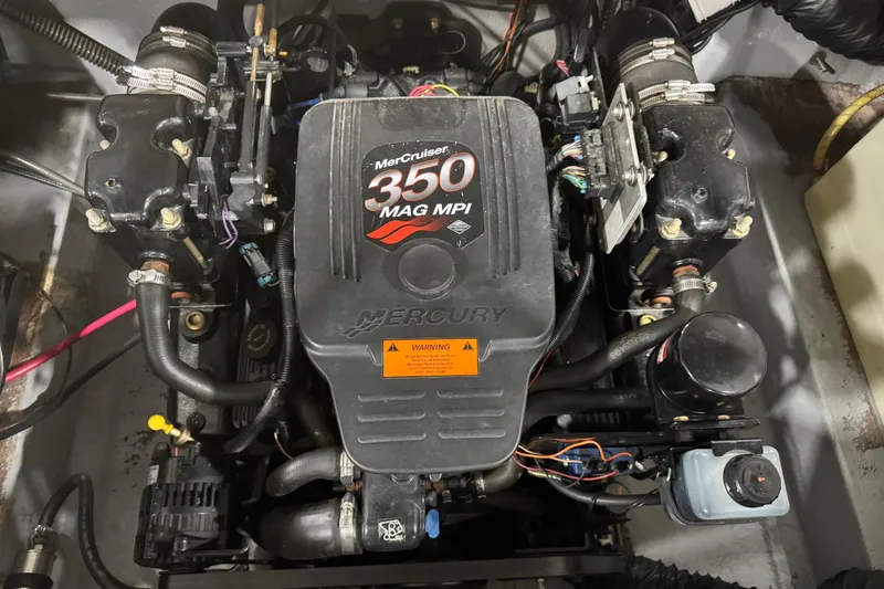 Slide: The Image of MerCruiser 350 MAG MPI engine in a 2003 Crownline 270 BR boat. - 11