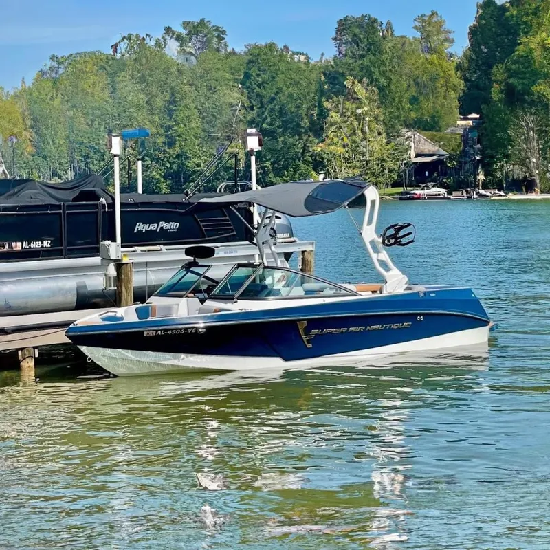 The Image of 2020 Nautique Super Air Nautique 210 boat docked. - 0