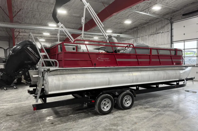 Slide: The Image of 2014 Bentley Pontoons 243 Cruise pontoon boat on trailer in indoor storage. - 4