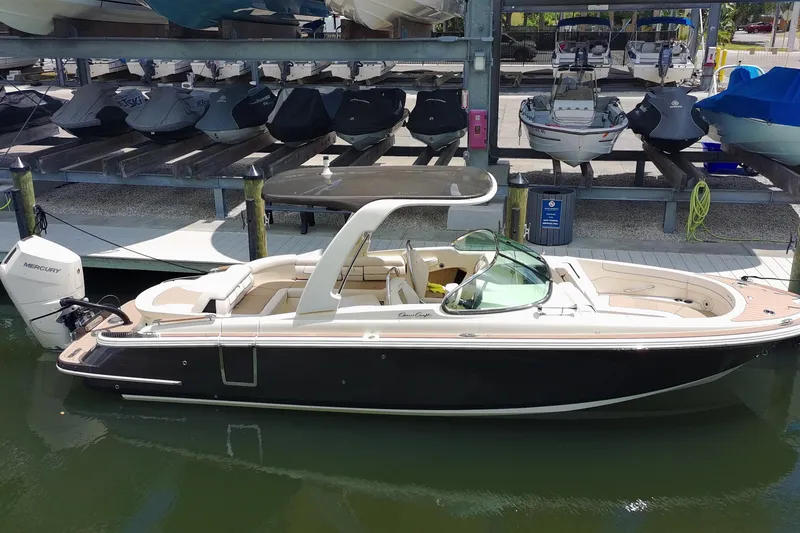 The Image of 2024 Chris-Craft Launch 28 GT boat docked, featuring sleek design and modern amenities. - 0