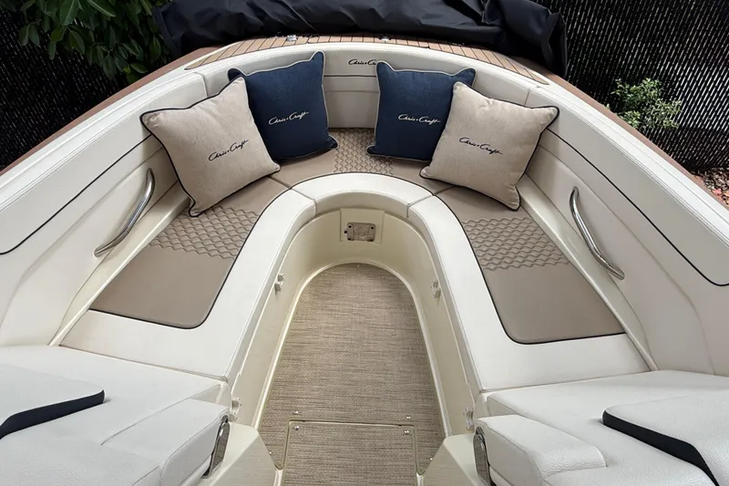 Slide: The Image of 2024 Chris-Craft Launch 28 GT boat interior with compact bathroom and toilet. - 18