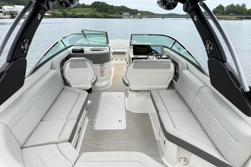 Slide: The Image of Luxurious 2022 Sea Ray SLX 280 boat interior with spacious seating and modern design. - 11