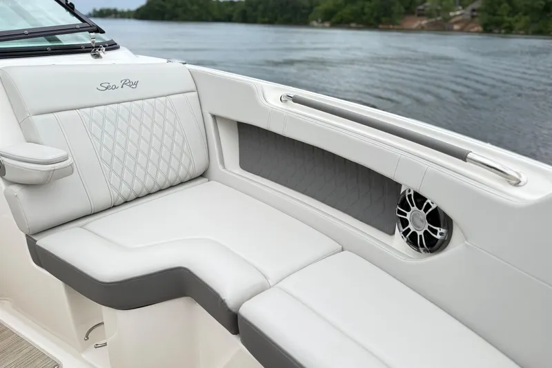Slide: The Image of Luxurious seating on 2022 Sea Ray SLX 280 boat, featuring elegant white upholstery. - 20
