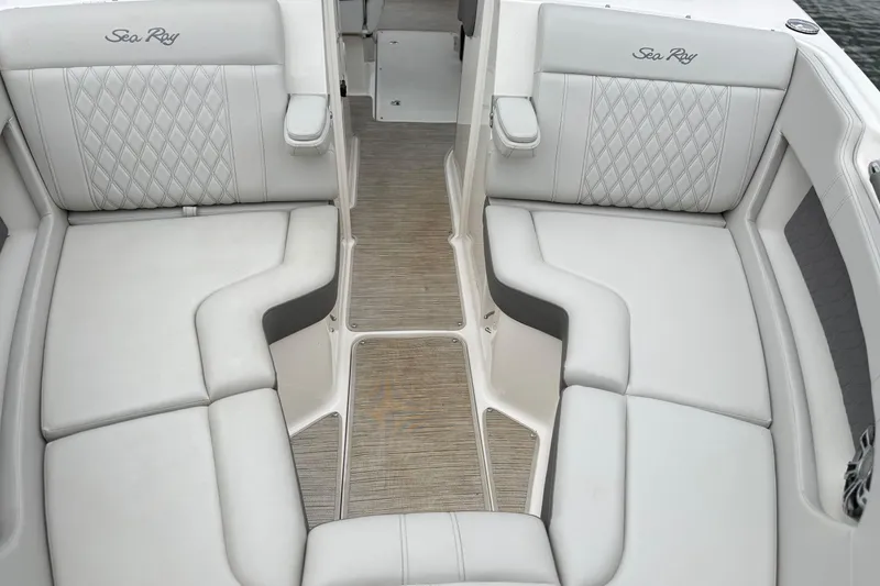 Slide: The Image of Luxurious seating on 2022 Sea Ray SLX 280 boat with elegant upholstery design. - 21