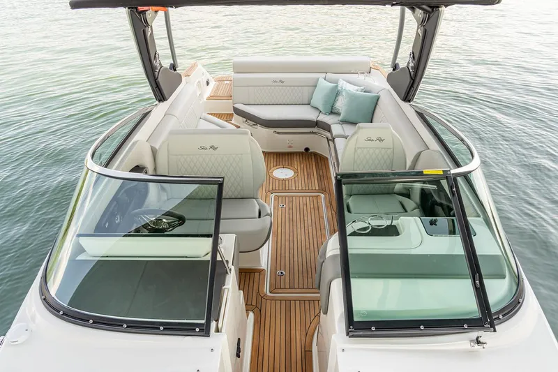 Slide: The Image of Manufacturer Provided Image: 2022 Sea Ray SLX 280 boat interior with luxurious seating and teak flooring. - 8