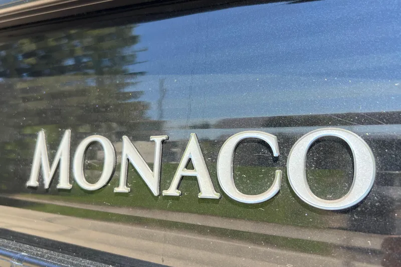 Slide: The Image of Close-up of 'Monaco' lettering on 2023 Godfrey Monaco 235 SB boat. - 10